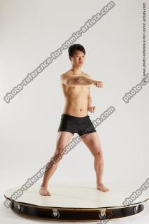 asian man taekwondo poses lan 16b